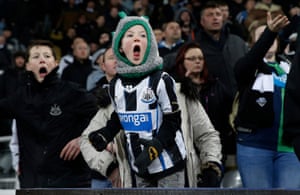 A young Newcastle fan shouts in desperation
