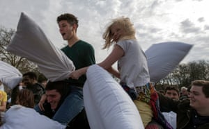 Members of the public take part in an International Pillow Fight Day event on Kennington Park in London, UK. The Pillow Fight Day attracts tens of thousands people in more than 100 cities all over the world each year