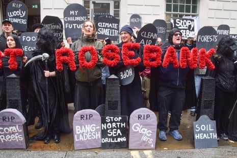 Activists from the climate action group Fossil Free London staging a death-themed protest against the Jackdaw gasfield and the Rosebank oilfield outside the DESNZ HQ in London.