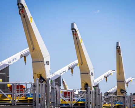 Wind turbine components against a blue sky