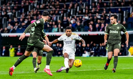 Real Madrid's Rodrygo (centre) scores his side's fourth goal.