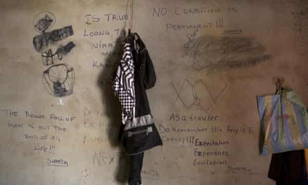 Messages written by Gambian migrants, who were deported from Libya.
