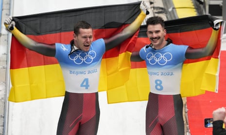Germany’s Christopher Grotheer (left) and his team-mate Axel Jungk celebrate winning the gold and silver medals in the men’s skeleton.