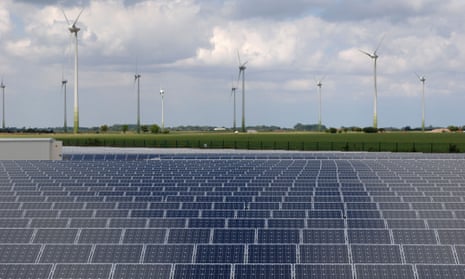 Solar electric power station and wind farm at Fen Farm near Louth, Lincolnshire, UK. 