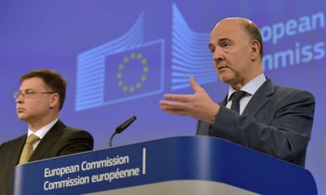 Pierre Moscovici speaks at a news conference