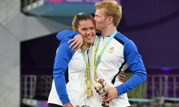 Scotland's Grace Reid and James Heatly with their gold medals in the mixed synchro 3m springboard
