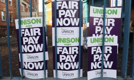 'Fair Pay Now' posters