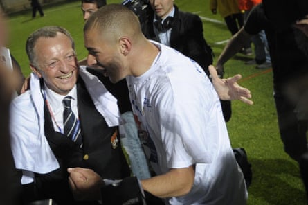 Lyon’s Karim Benzema celebrates with president Jean-Michel Aulas in May 2008 after their seventh straight French championship