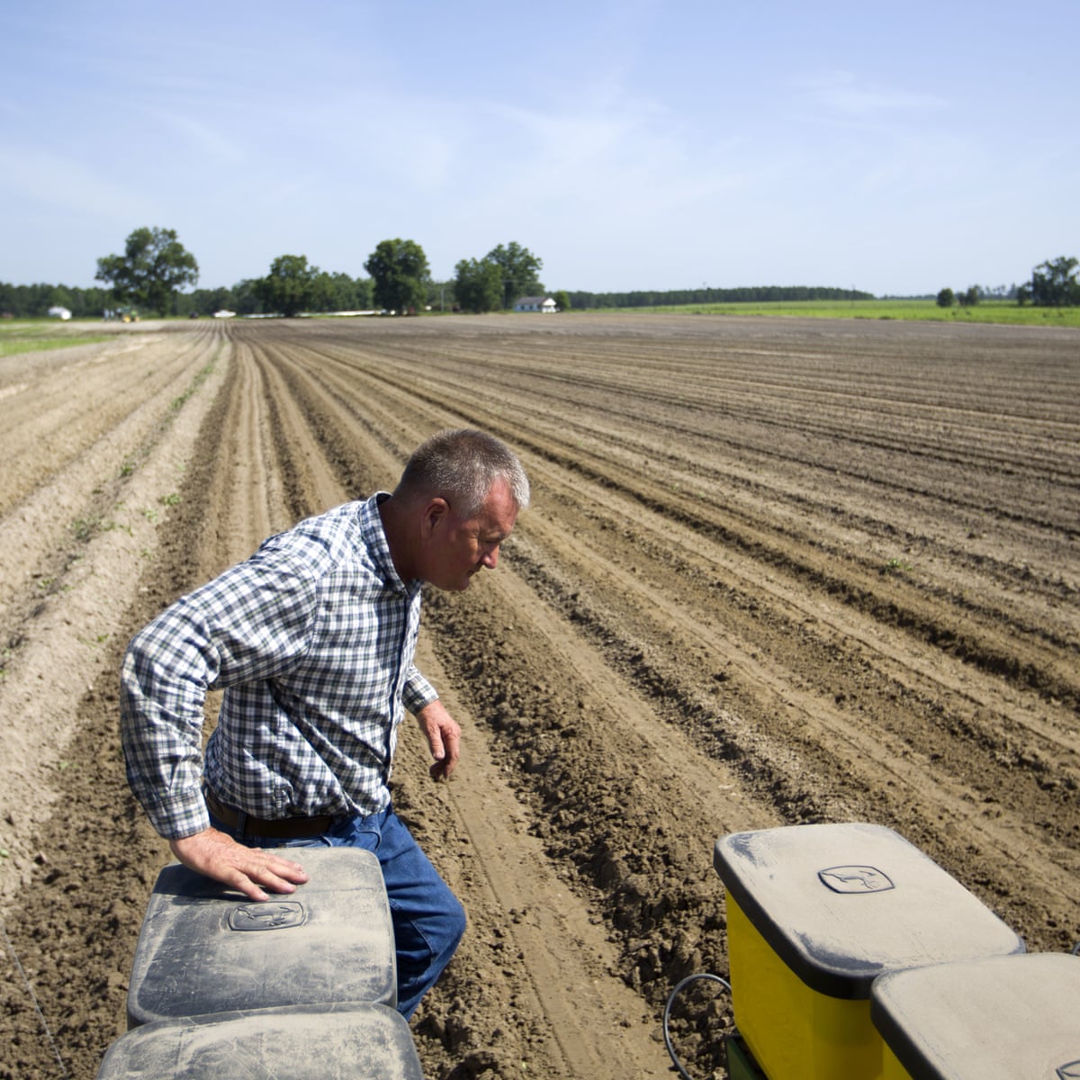 Trump administration to provide $12bn in aid to farmers hurt by tariffs | US news | The Guardian