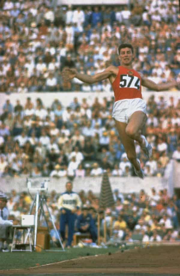 Soviet long jumper Igor Ter-Ovanesyan leaping through air at the 1960 Olympics.