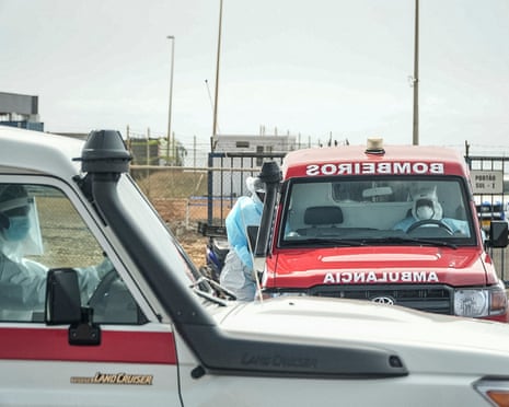 Health personnel evacuating passengers from the cruise ship MV Hondius, are seen at the Nelson Mandela International airport of Praia, the capital of Cape Verde.