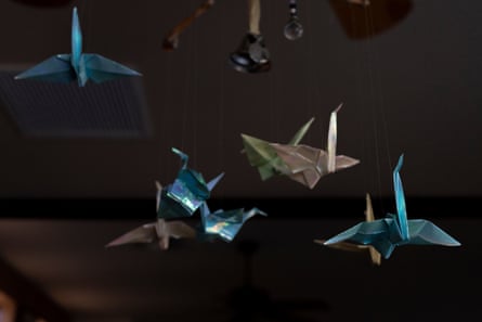 Paper cranes, a Christmas gift from Heather Thompson, are displayed in her mother’s home office.