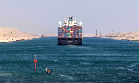 A container ship sails through the Suez canal in Ismailia, Egypt.