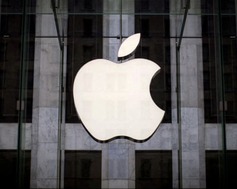 An Apple logo hangs above the entrance to the Apple store on 5th Avenue in the Manhattan borough of New York City.