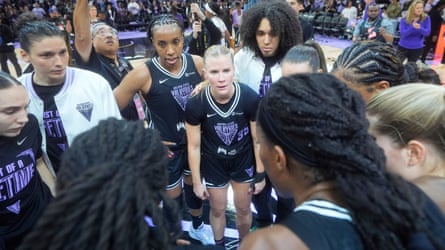Golden State Valkyries players gather on court after their opening game.