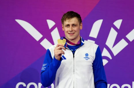 Stephen Clegg of Scotland celebrates with his gold medal after winning in the men’s 50m freestyle S13 event.