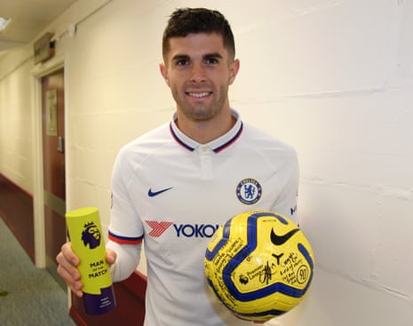 Chelsea’s hat-trick hero Christian Pulisic proudly shows off the matchball and the Man of the Match award.
