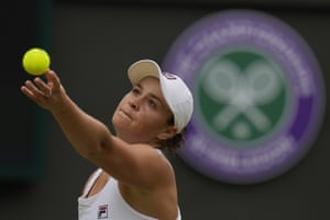 Australia's Ashley Barty serves Barbora Krečkova of the Czech Republic.