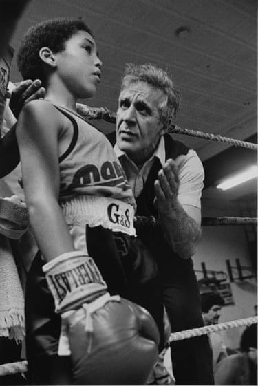 Trainer Neil Ferrara and David Brown, 9 years old forty-five pounds, twenty-eight fights, and twenty-four wins. Lunar Gym, Brooklyn 1980 LaGalerieRouge