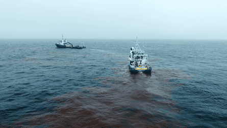 Two research vessels in the ocean