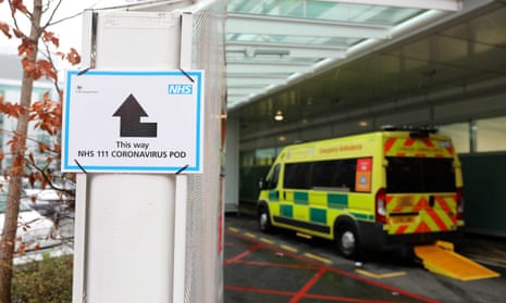 A sign directs patients towards a coronavirus pod at St Thomas’ hospital in London.