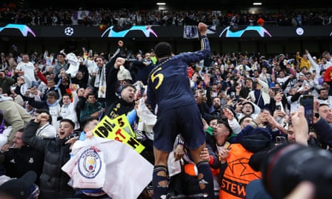 Jude Bellingham celebrates with the Real Madrid fans after their penalty shootout victory over Manchester City.