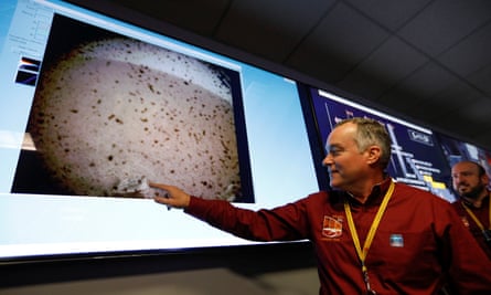 Tom Hoffman of Nasa points to the first picture of Mars sent back by the InSight lander