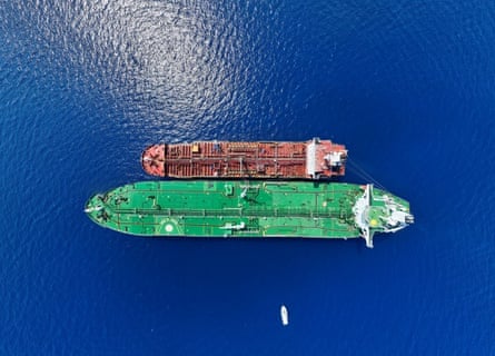 A drone captures an image of a ship-to-ship transfer of sanctioned Iranian oil.