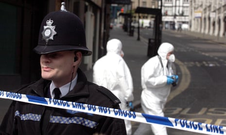 Police and a forensics team investigate a stabbing in Nottingham city centre.