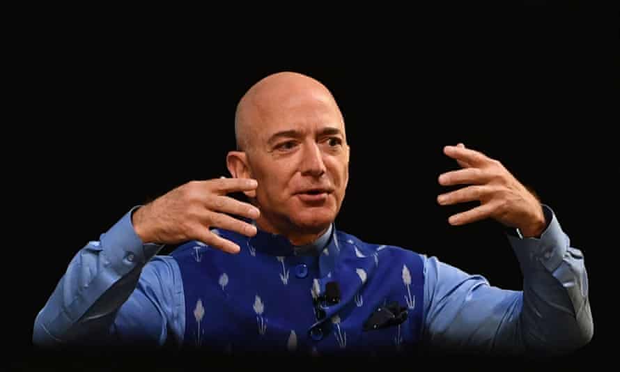 FILES-US-SPACE-BLUEORIGIN-BEZOS
(FILES) In this file photo the CEO of Amazon Jeff Bezos (R) gestures as he addresses the Amazon’s annual Smbhav event in New Delhi on January 15, 2020. - Amazon founder Jeff Bezos announced on June 7, 2021 he will fly into space next month on the first human flight launched by his Blue Origin rocket firm. “Ever since I was five years old, I’ve dreamed of traveling to space. On July 20th, I will take that journey with my brother,” Bezos said on his Instagram account. (Photo by Sajjad HUSSAIN / AFP) (Photo by SAJJAD HUSSAIN/AFP via Getty Images)