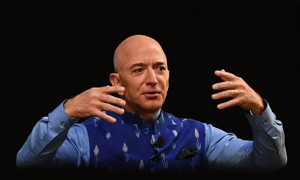 FILES-US-SPACE-BLUEORIGIN-BEZOS<br>(FILES) In this file photo the CEO of Amazon Jeff Bezos (R) gestures as he addresses the Amazon’s annual Smbhav event in New Delhi on January 15, 2020. - Amazon founder Jeff Bezos announced on June 7, 2021 he will fly into space next month on the first human flight launched by his Blue Origin rocket firm. “Ever since I was five years old, I’ve dreamed of traveling to space. On July 20th, I will take that journey with my brother,” Bezos said on his Instagram account. (Photo by Sajjad HUSSAIN / AFP) (Photo by SAJJAD HUSSAIN/AFP via Getty Images)