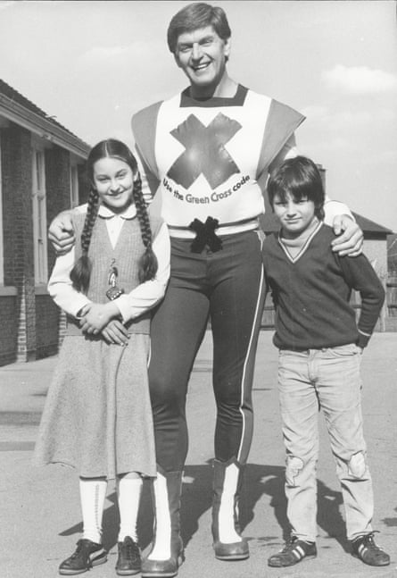 David Prowse as the Green Cross Man, the superhero of road safety.