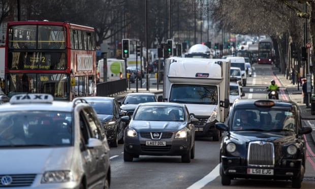 Vehicles pass along Marylebone Road in London in February