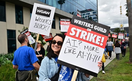 Writer Ilana Pena holds a sign on the picket line on the fourth day of the strike on 5 May 2023.