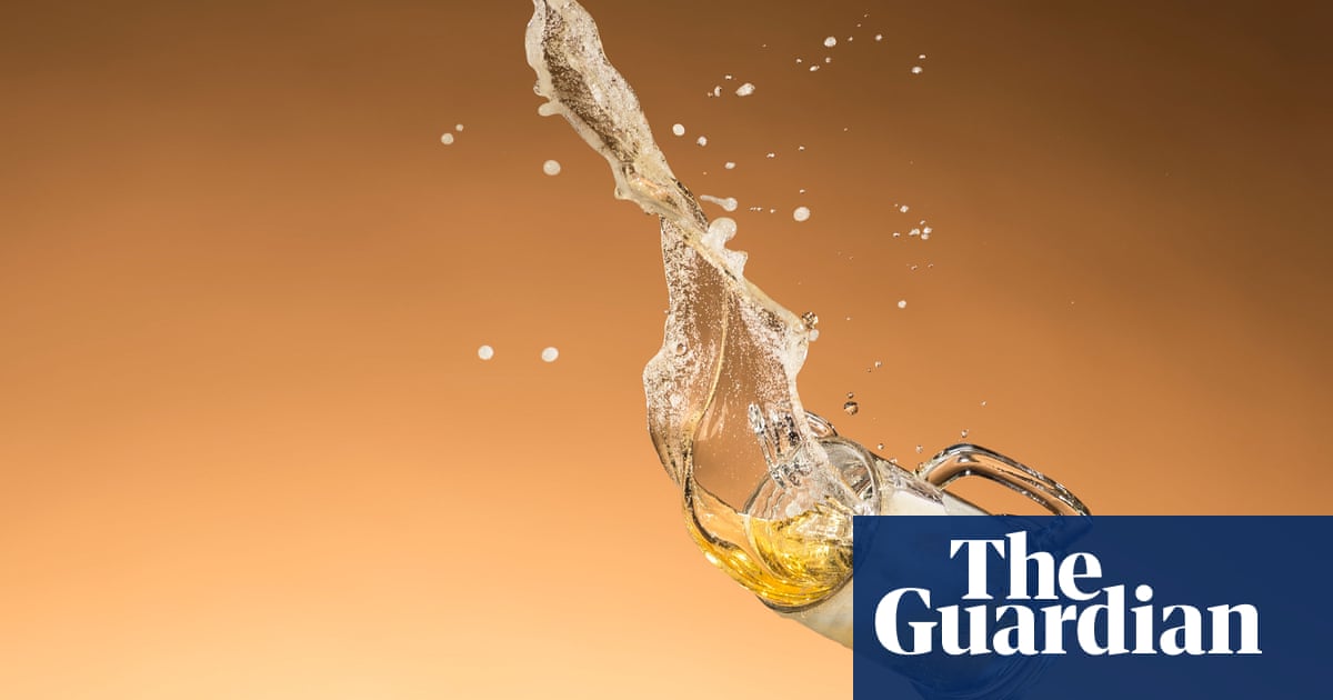 Avoid booze and close the curtains: how to cope in England’s 40C heatwave