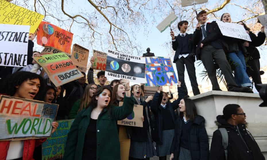 Students take part in the climate change strike in London.