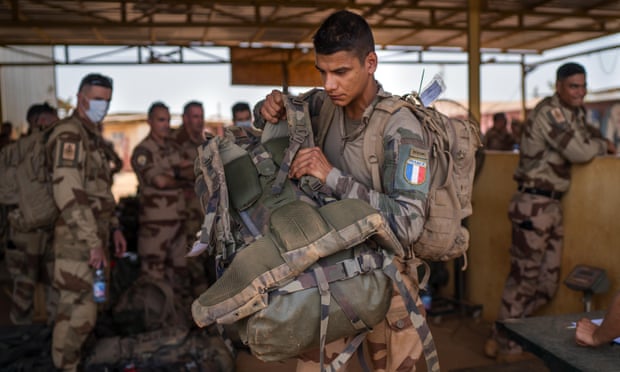 French soldiers wrapping up a four-month tour of duty in the Sahel leave their base in Gao, Mali.