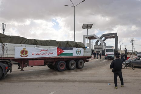 An aid convoy transporting a Jordanian field hospital enters the Gaza Strip through the Rafah crossing.