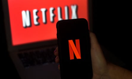Netflix logo on phone and screen