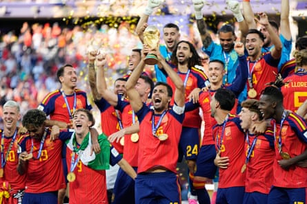 Spain’s Rodri lifts the trophy with teammates after winning the World Cup final
