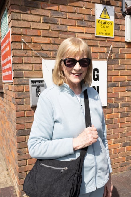 Christina Spackman in sunglasses posing for a picture in the street