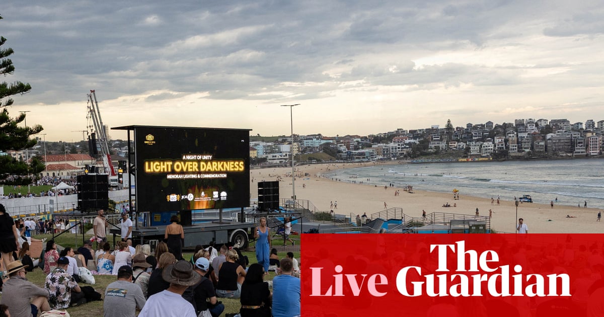 Bondi terror attack updates: vigil observes minute’s silence at 6.47pm to mark one week since shooting; PM booed on arrival
