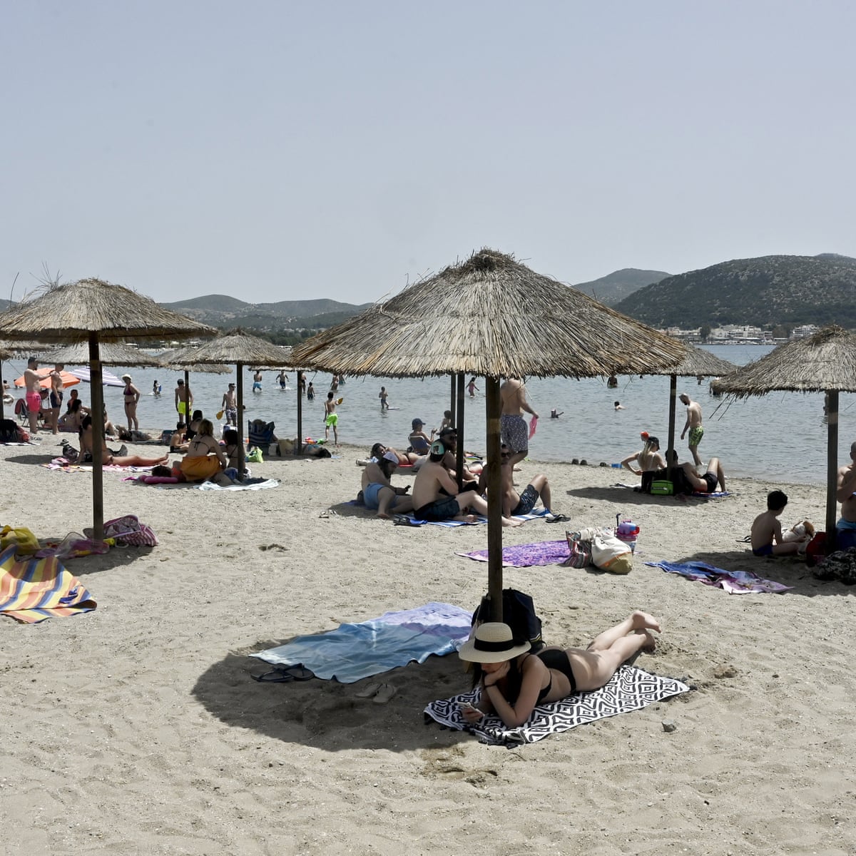 Freedom For Greek Beachgoers Under Drone S Watchful Eye World News The Guardian