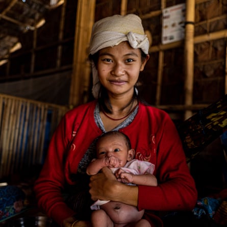 San San Htay, 18, and her eight-month old son, Saw San Myint Oo, in Law Kaw IDP camp, Myanmar, in March 2023.