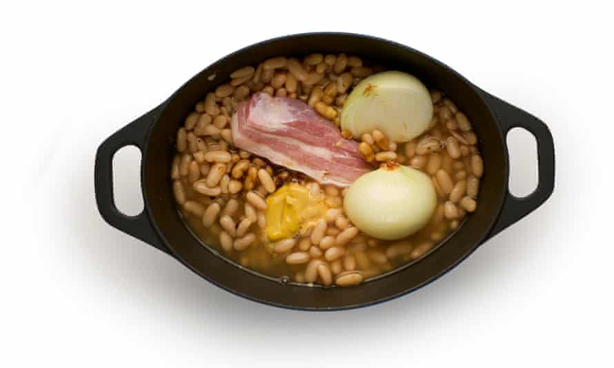 Stir in the English mustard, salt and molasses into the beans. Push the bacon, skin side up if it still has its rind, and the onion cut side down into the beans, replace the lid again and bake for three to four hours longer, until the beans are creamy and soft,