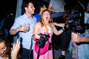 A woman with a stunned expression.
