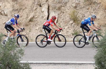 Enric Mas rides in the peloton during stage 14