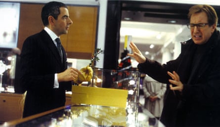 ‘I’ll never forget Alan’s agony’ … Rowan Atkinson and Alan Rickman in Love Actually.
