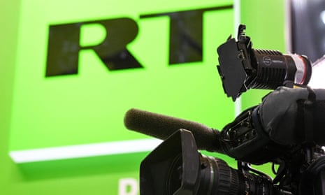 RT’s logo and a TV camera