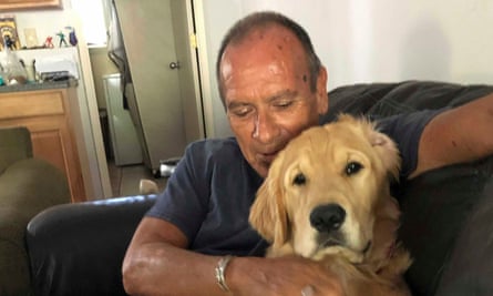 Franklin Trejos with his golden retriever Sam.